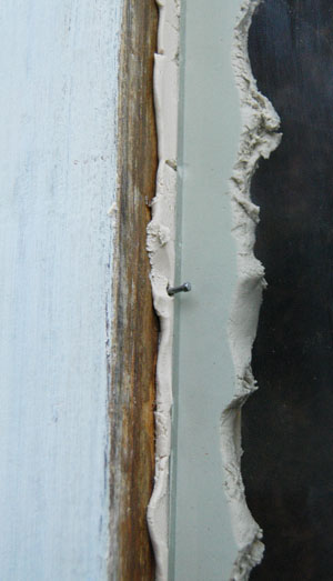 Glass pressed in to putty bed and pinned